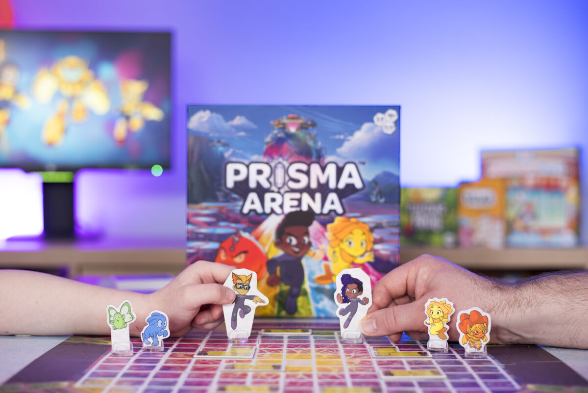 Prisma Arena Hub Games tabletop gameplay. Heroes and Mo'kons facing each other. Fight for hope!