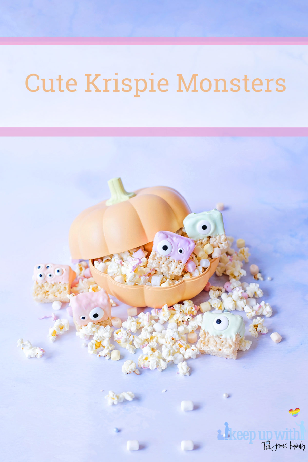 Image shows pastel coloured fun food rice krispie aliens or rice krispie monsters sat in a big orange pumpkin container filled with popcorn, which is spilling out.  Image by Sara-Jayne from Keep Up With The Jones Family. 
